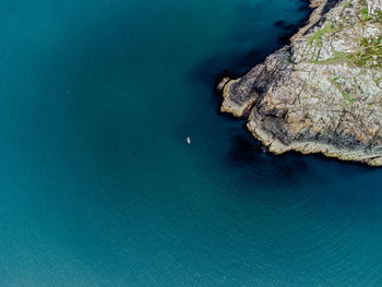 High angle view of rock formation in sea