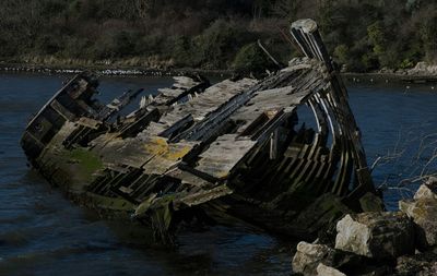 Old boat in water