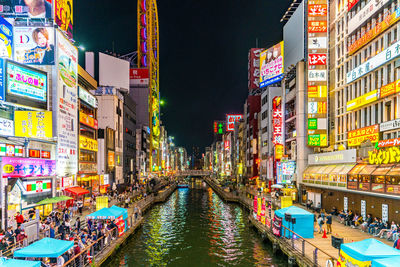 Illuminated city buildings at night