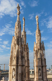 Low angle view of milan cathedral against sky