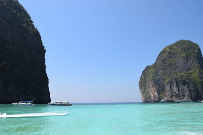 Scenic view of sea against blue sky