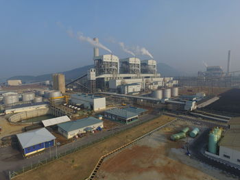 High angle view of buildings in city against clear sky