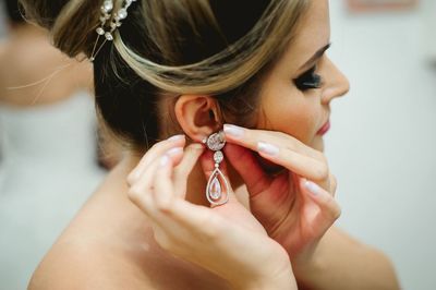 Close-up of beautiful woman wearing earring