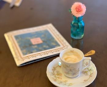 High angle view of coffee cup on table
