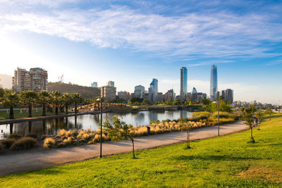 Skyline of buildings at providencia district from bicentennial park in vitacura, santiago de chile