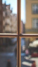 Close-up of glass window of building