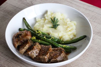 High angle view of meal served in plate on table