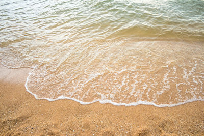 High angle view of surf on beach