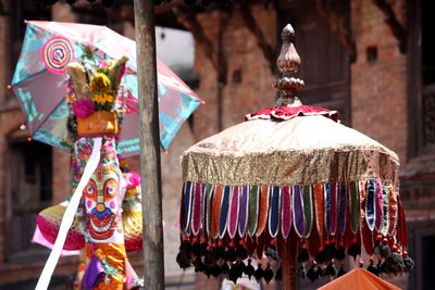 Multi colored umbrella in parade