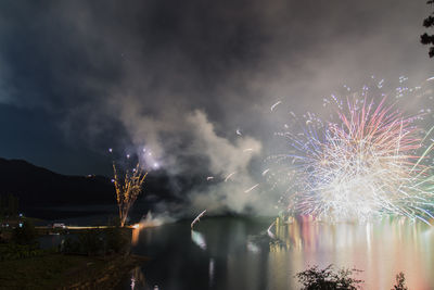 Firework display at night