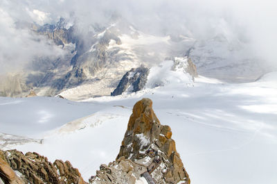 Scenic view of snow covered mountain