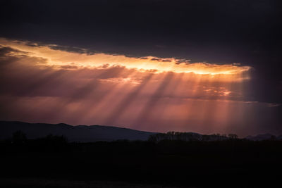 Scenic view of silhouette landscape against sky during sunset