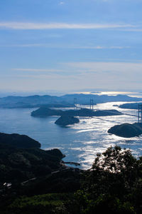 View of suspension bridge over sea