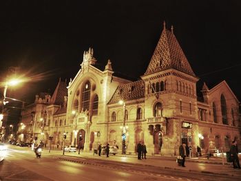 Buildings in city at night