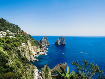 Scenic view of sea against clear sky