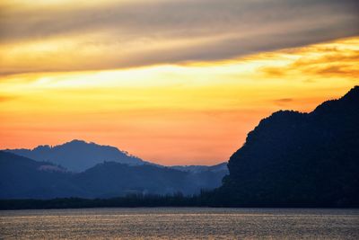 Scenic view of dramatic sky during sunset