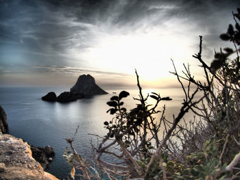 View of calm sea against cloudy sky