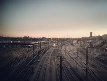 High angle view of railroad tracks against clear sky