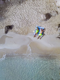 High angle view of man surfing in sea