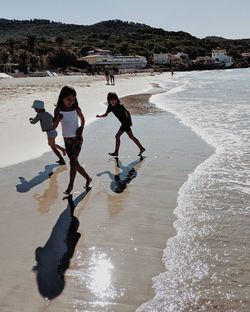 People enjoying on beach