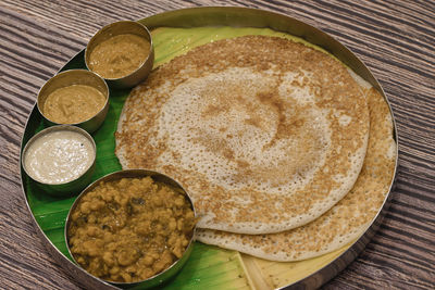 High angle view of food served on table