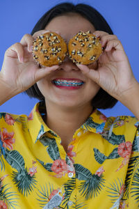 Close-up of woman holding ice cream