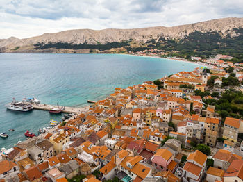 High angle view of town by sea