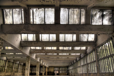 Low angle view of ceiling in abandoned warehouse