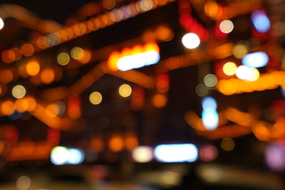 Defocused image of illuminated lights at night