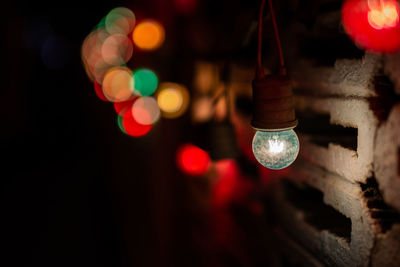 Close-up of illuminated light bulb