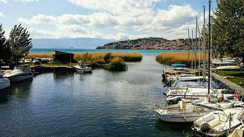 Boats moored at harbor