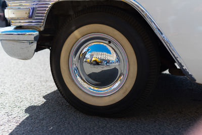 Cropped image of vintage car on road