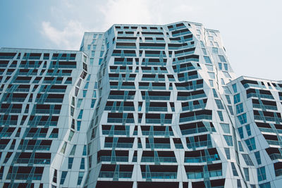 Low angle view of modern building against sky in city