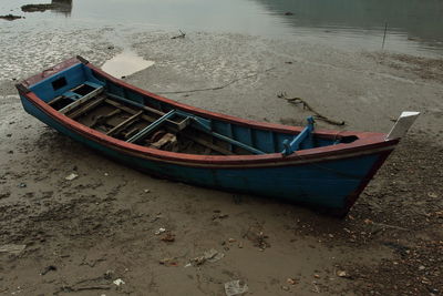 High angle view of boat moored on shore