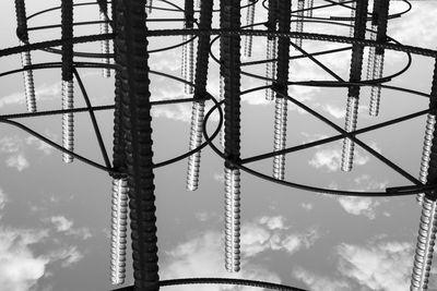 Low angle view of rollercoaster against sky