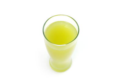 Close-up of drink against white background