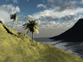 Scenic view of sea against cloudy sky