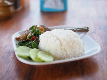 Close-up of food served on table