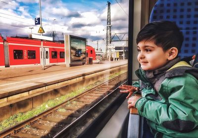 Portrait of young boy on train