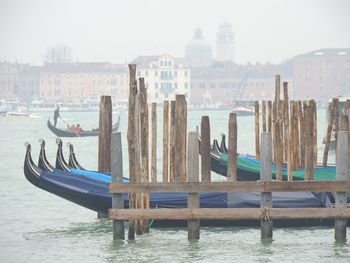 Boats moored in canal. venice