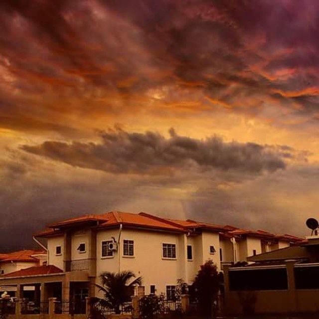 sky, architecture, building exterior, cloud - sky, built structure, cloudy, sunset, weather, house, dramatic sky, overcast, cloud, storm cloud, low angle view, residential structure, residential building, orange color, atmospheric mood, cloudscape, nature