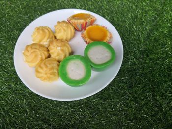 High angle view of salad in plate on field