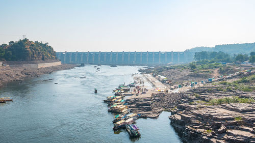 Bridge over river against clear sky