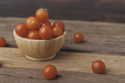 Close-up of tomatoes on wooden table