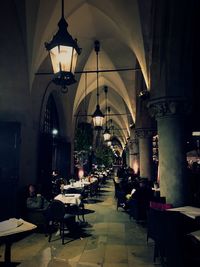 Empty chairs and tables in cafe