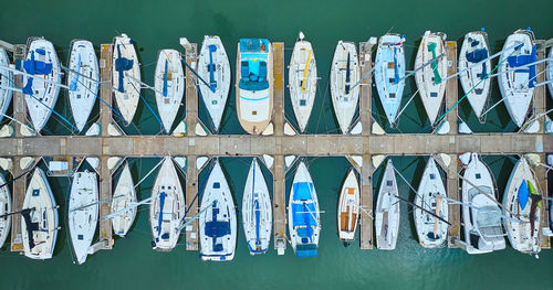 High angle view of colorful clothes hanging on wall