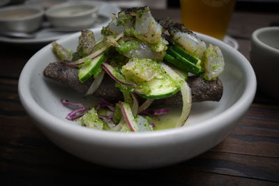 Close-up of salad in bowl on table