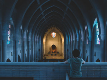 Rear view of person in church