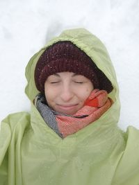 Close-up of young woman wearing warm clothing during winter