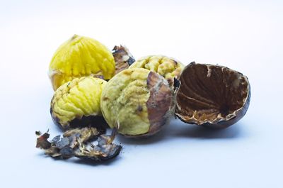 Close-up of fruits against white background